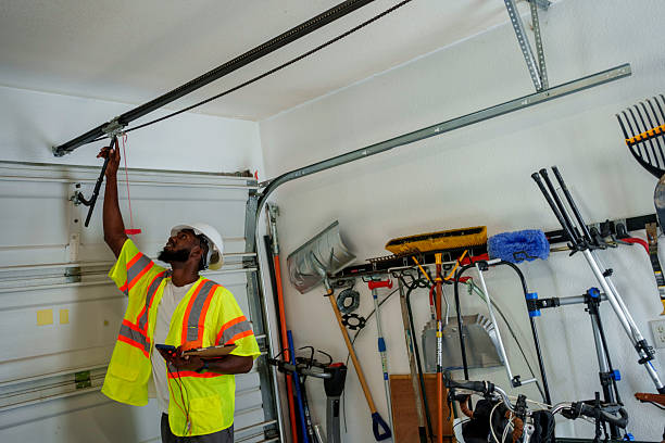 Professional Garage Door Roller Replacement technician working in Livingston County County, MI
